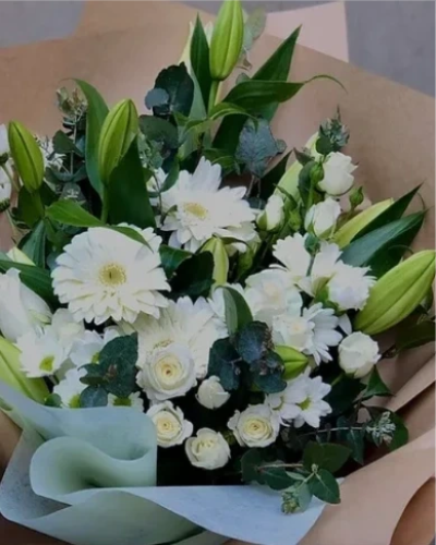 Dromana Bouquet - A beautiful arrangement of classical white flowers, perfect for expressing your sentiments. This bouquet is designed to bring warmth and joy to any setting.