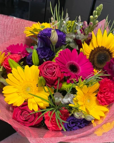 Dani's Rainbow - A unique blend of textures and colours, this bouquet combines vibrant blooms. Perfect for those looking for a modern twist on the classic bouquet.