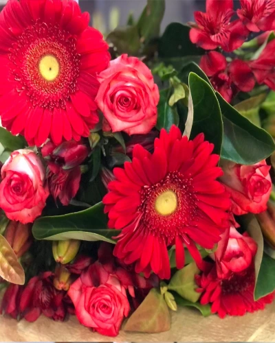 UTopia With Love - A choice of lasting seasonal blooms. This bouquet is full of love and warm wishes.